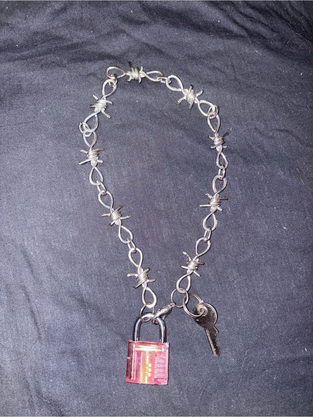 Dolls Kill Silver Barbed Wire Chain Necklace with Pink Padlock and Key